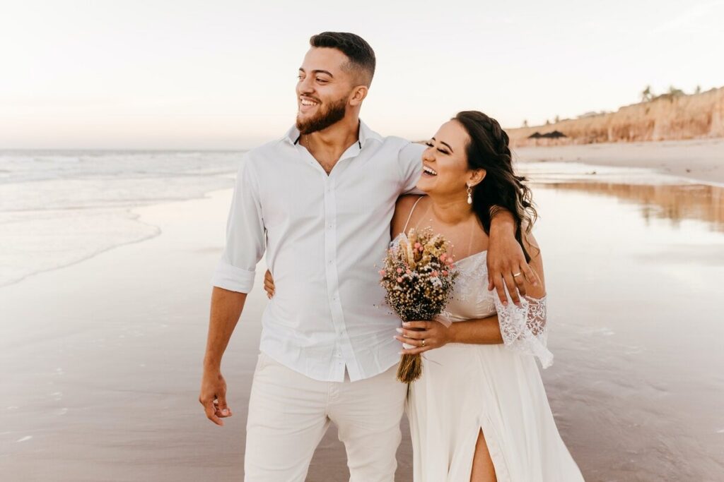 Couple enjoying their wedding after using a travel agent for their destination wedding.